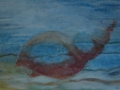 Bruine schelp zwevend in water